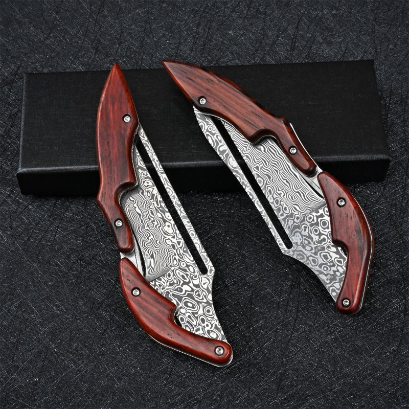 Mechanical folding knife