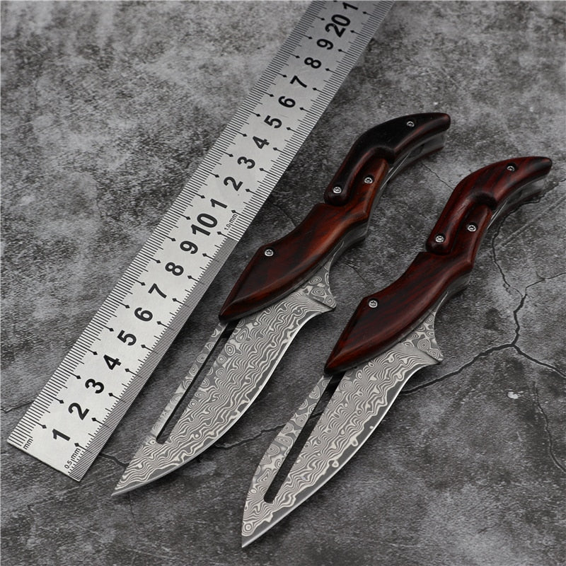 Mechanical folding knife